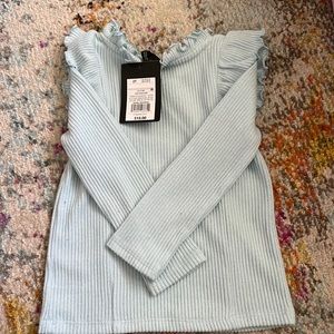 Baby blue long sleeve $12 with tag